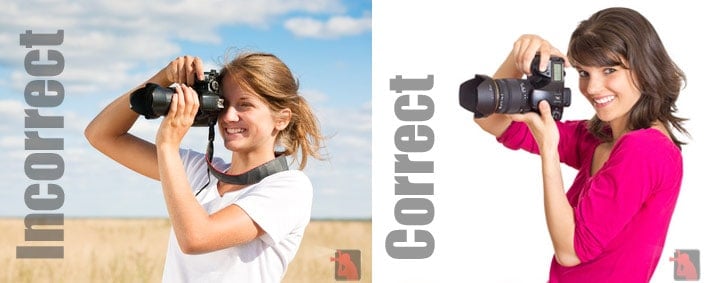 Two models holding cameras--one correctly, and the other one holding it the wrong way.