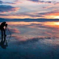 Photographer learning the craft as he shoots a sunrise