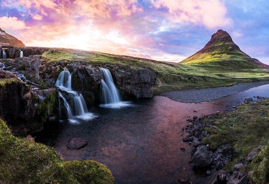 I shot this picture in Iceland. It was a gorgeous sunset, but one thing that helped me to make the color look dynamic is that I shot very wide to include some of the blue sky on the sides of the colorful areas.