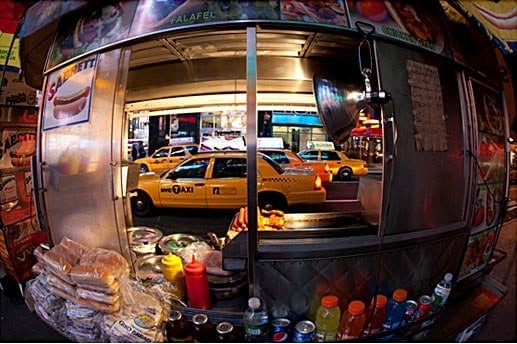 Photography tip of shooting into a busy city street with a fisheye lens.