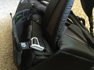 The ingenious magnetized "lock" on the side of the bag that you can reach back to and easily dis-latch to rotate the belt pack around.