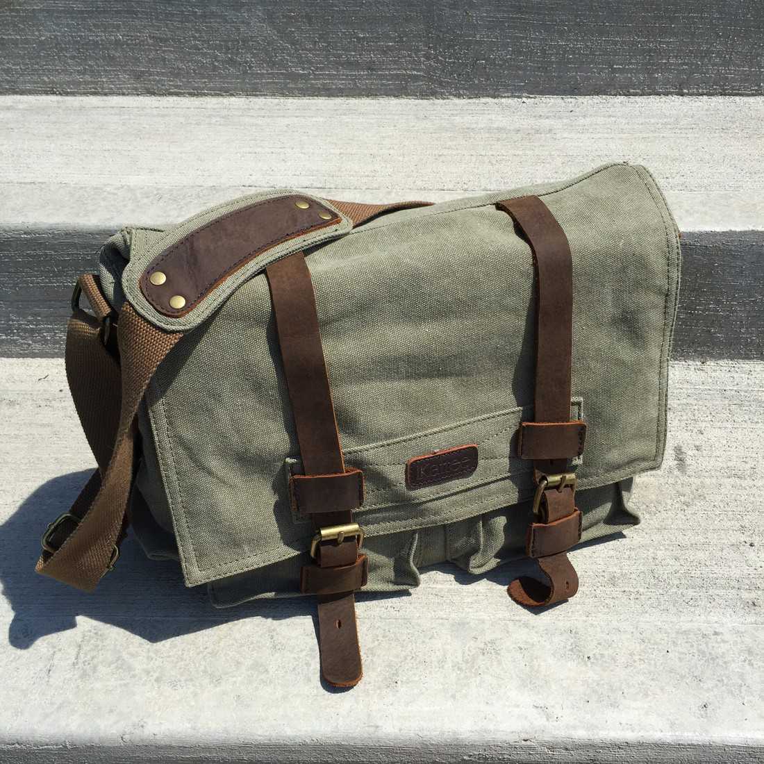 Khaki Canvas Carry Shoulder Messenger Bag can be used as a camera bag 