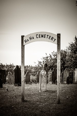 A sepia toned photo of the Ha Ha Cemetery in New Brunswick.
