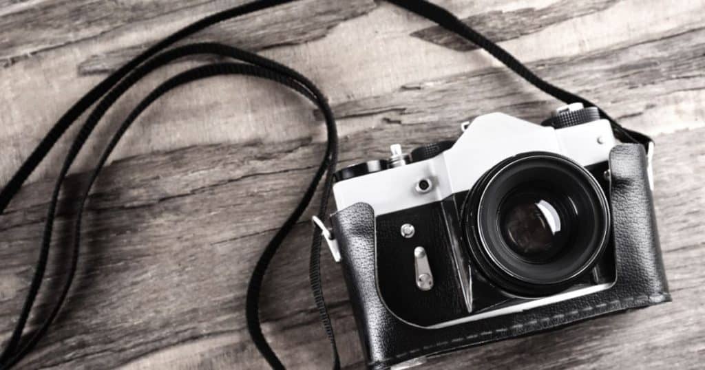 Camera with black leather strap